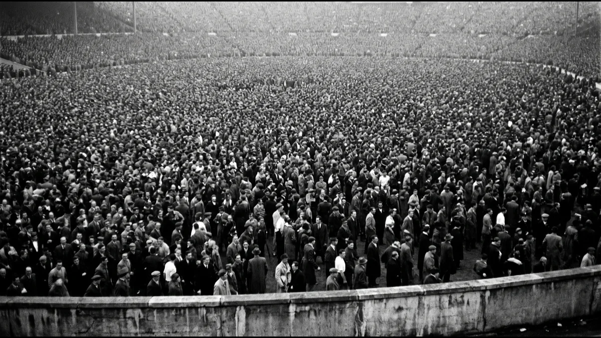 Illustration in the style of a mid-century press photograph: a vast packed open standing terrace of spectators in black and white, faces indistinct. Not an archive image