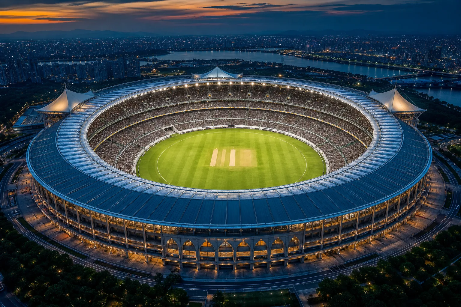 High aerial view of a vast multi-tier stadium at golden hour