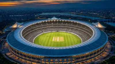 High aerial view of a vast multi-tier stadium at golden hour