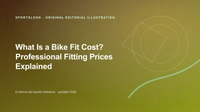 Road bike on a fit stand beside a bike-fitting cost card